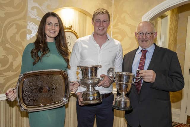 David and Rebecca Simpson, Damm Herd, Lisburn,  collected an array of silverware at Holstein NI’s 23rd annual dinner in Ballymena. They are pictured with guest Michael Smale, chairman, Holstein UK.Picture: Kevin McAuley/McAuley Multimedia