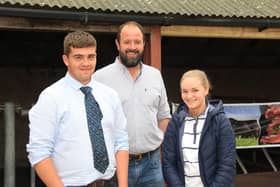 Stephen Wallace, Garvagh, with James and Evie Morrison, Maguiresbridge, at the NI Aberdeen Angus Club’s open day. Picture: Julie Hazelton