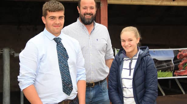 Stephen Wallace, Garvagh, with James and Evie Morrison, Maguiresbridge, at the NI Aberdeen Angus Club’s open day. Picture: Julie Hazelton