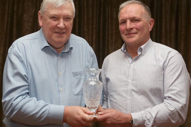 Cecil Morton (left) winner of the Houston Trophy, receiving his award from Robin Clements, Chairman of Fermanagh Grassland Club. Pic: Raymond Humphreys