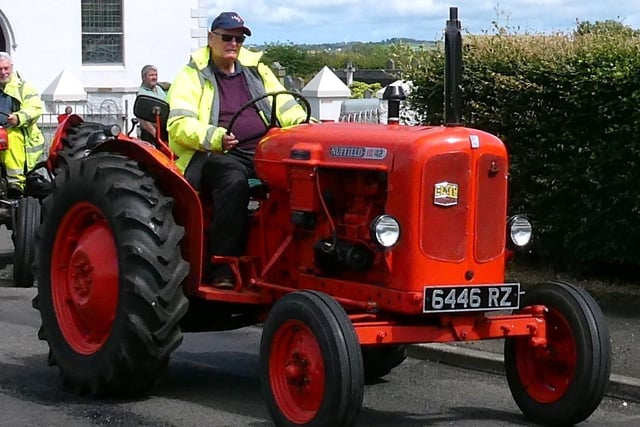 Ernie Park from Connor hits the road at the annual pre 1976 tractor run organised by the Traction Engine Club of Ulster. Picture: Alan Hall