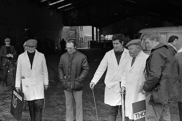 Pictured in December 1981 watching the judging at a show and sale of Landrace pigs which was held at Cookstown. Picture: Farming Life archives/Darryl Armitage