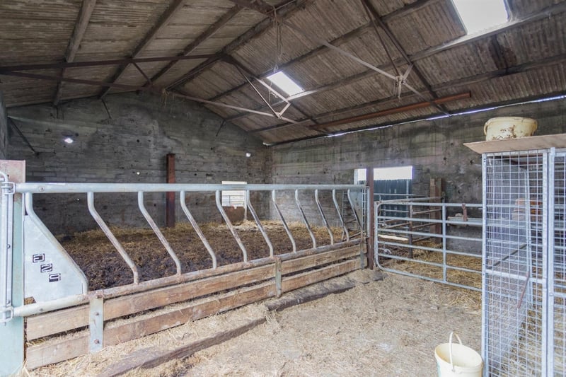 The property includes a traditional modernised farmhouse, range of outbuildings and lands surrounding the farmyard.