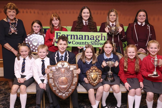 Winners of The School's Section at Fermanagh Show are front from left, Emily Drugan, Issac Burns, The Model PS; Charles Welsh, Devenish College; Jenny Foy, Tessa Fivey, Derrygonnelly PS and Lydia Condell and Eve Johnston, Lisbellaw PS. Back from left, Laura Rogers, Fermanagh Show; Amy Graham, The Model PS; Isabella Mathers, Lisbelaw PS and Orlagh McKeever, Orlaith Maguire, Oily Love, St Fanchea's College.