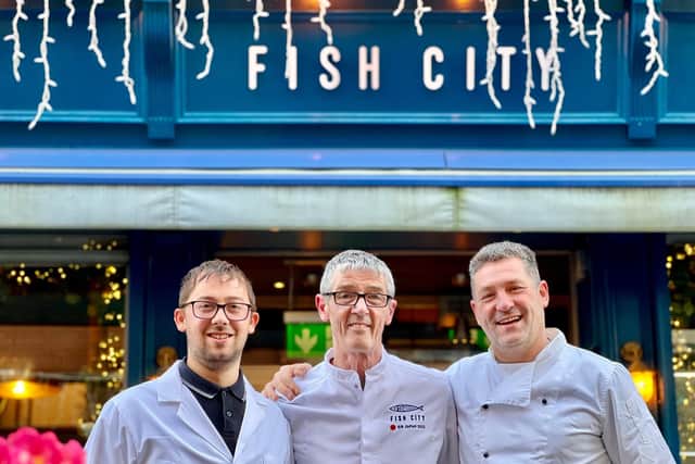 John Lavery, centre, owner of Fish City in Belfast, with Geoff and Sam Whitehead, directors of Whitehead’s in Yorkshire. (Pic supplied by Sam Butler)