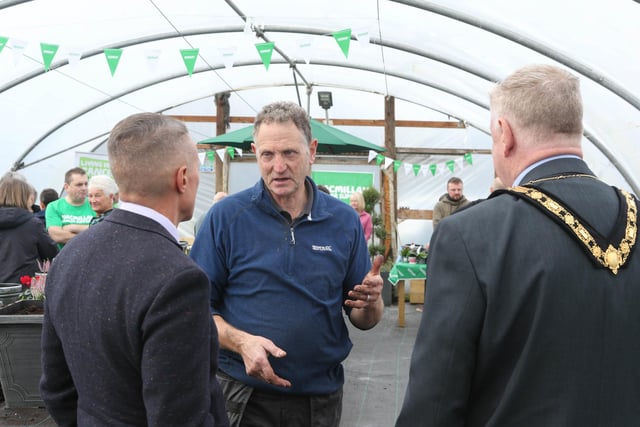 Andrew McClarty chats with the Mayor of Causeway Coast and Glens, Councillor Steven Callaghan and Chief Executive David Jackson at Council’s Macmillan Move More ‘Feel-Good Gardening’ project. Pic: McAuley Multimedia