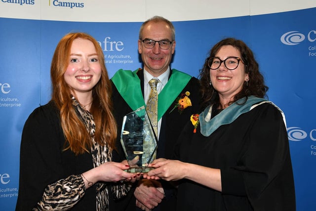 Aimee Copeland (Randalstown) received the Department of Agriculture, Environment and Rural Affairs Prize awarded to the top Level 3 Advanced Technical Extended Diploma in Horticulture student at the Greenmount Graduation Ceremony. Congratulating Aimee is Martin McKendry (CAFRE Director) and Lori Hartman (Senior Lecturer, CAFRE). Pic: CAFRE
