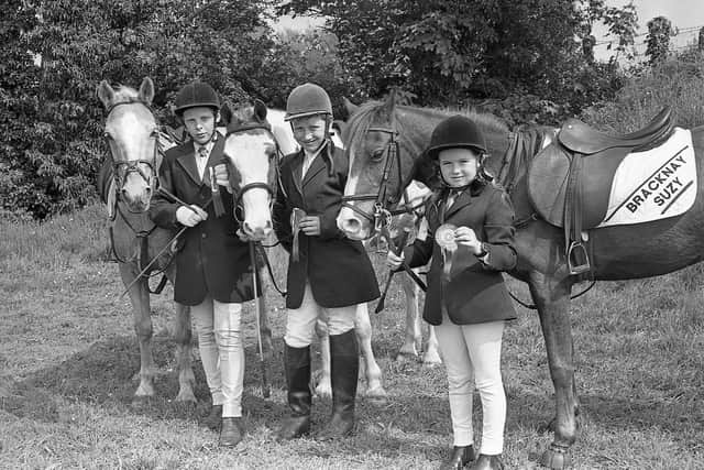 Pictured at the end of May 1992 at the Newry Show are the first prize winners in the 12.2 novice pony class, from left, Stephen Rooney, Forkhill, with Golden Haze, Shane McFadden, Omagh, with Scooby Do, and Tina Barkley, Ballymoney, with Bracknay Suzy. Picture: Farming Life archives/Darryl Armitage