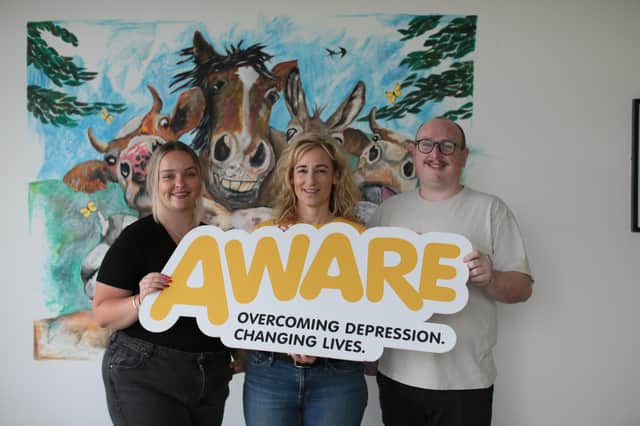 Pictured L-R: Emma Fitzgerald, Lisa Abell-Farrelly from AWARE NI and Daniel Baxter