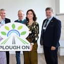 Judith McCann, National Lottery Community Fund, with representatives from Rural Support and the Plough On project