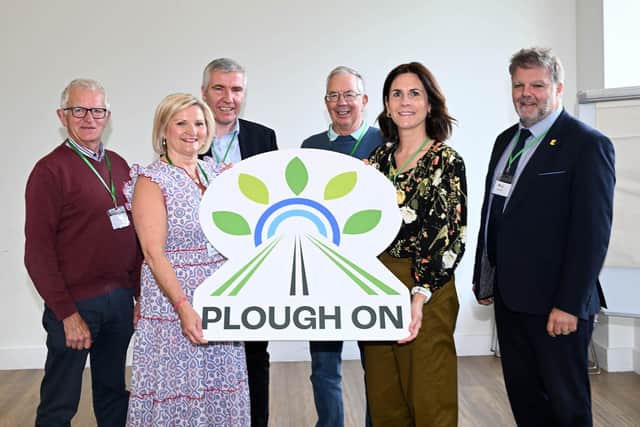 Judith McCann, National Lottery Community Fund, with representatives from Rural Support and the Plough On project
