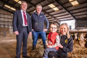 Pictured is William Irvine, deputy president of Ulster Farmers’ Union, Brian Matthews from participating farm Donagh Cottage Farm, Donaghcloney, Lauren Hamilton, sales development manager from NFU Mutual and farming enthusiast Gabriel Murray age 4.