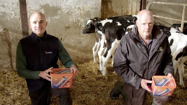 Luke Morgan, from Crystalyx, (left) recently called-in with Warrenpoint milk producer, Anthony Murney.