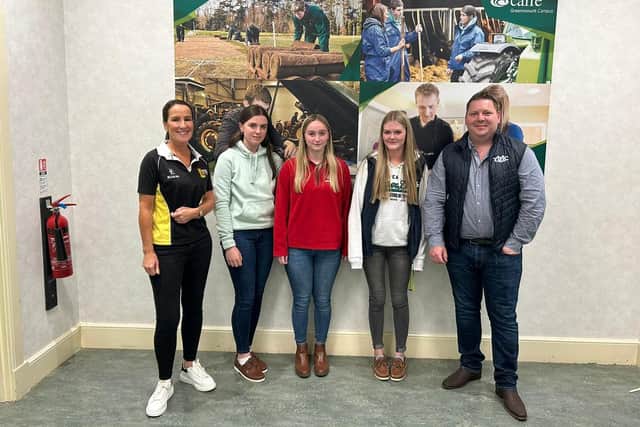 Stephanie Berkley, manager of the Farm Safety Foundation (left) with CAFRE, Greenmount campus students and YFCU president, Stuart Mills (right). Picture: YFCU