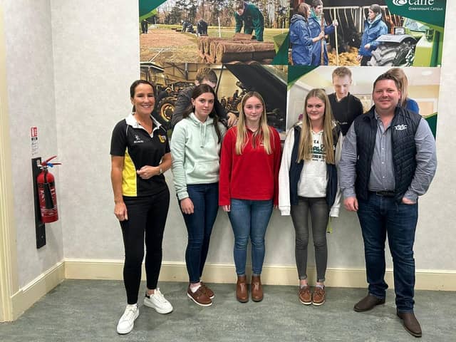 Stephanie Berkley, manager of the Farm Safety Foundation (left) with CAFRE, Greenmount campus students and YFCU president, Stuart Mills (right). Picture: YFCU
