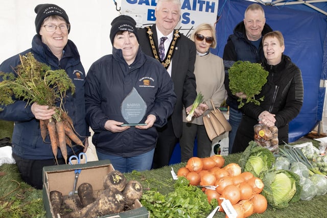 Mayor, Councillor Steven Callaghan and Lord-Lieutenant of County Londonderry, Alison Millar join customers to check out some of the fresh produce on offer at Galbraith’s Farm Shop, with traders Denise & Sandra. Pic: McAuley Multimedia
