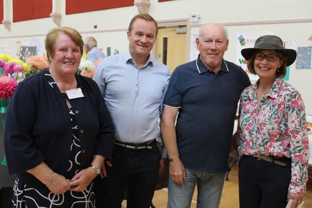 Last Saturday Banbridge and District Horticulture society held their annual vegetable and flowers show in Bannside Presbyterian church hall Banbridge with another huge crowd in attendance. Included are the society members Lettie Fleming Dr Gerry Ramsey and Geoffrey Davidson with Clare Woods who opened the show. Picture: Billy Maxwell