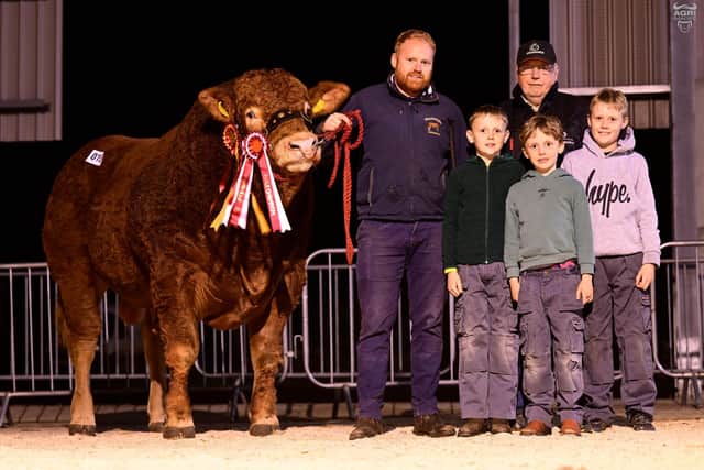 OCTOBER: The O’Kane family with their supreme overall champion Gleneagle Trex at Ballymena.  Picture: Agri-Images
