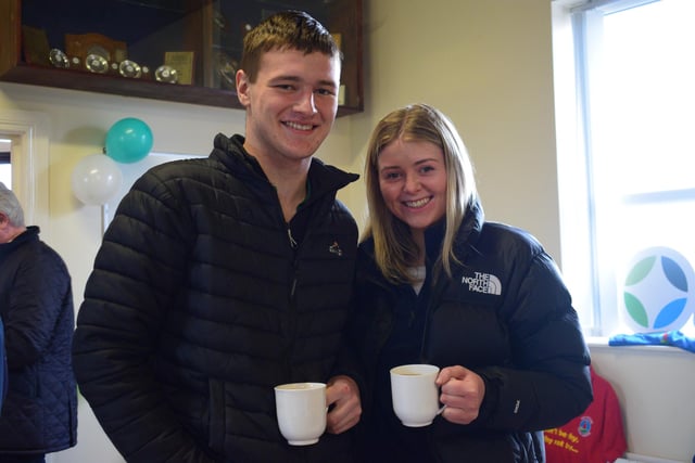 Callum and Jessica McConnell enjoying a cuppa at the big breakfast which was held by Holestone YFC. Picture: Holestone YFC