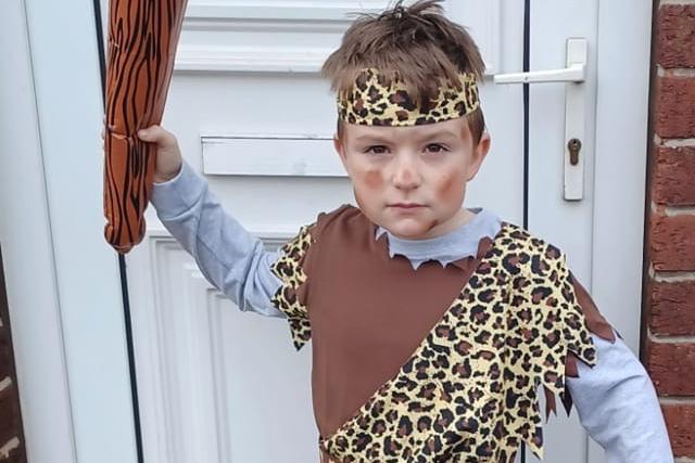 Zachary Warrington, aged eight, went all out as Stone Age Boy, a book written by Satoshi Kitamura.