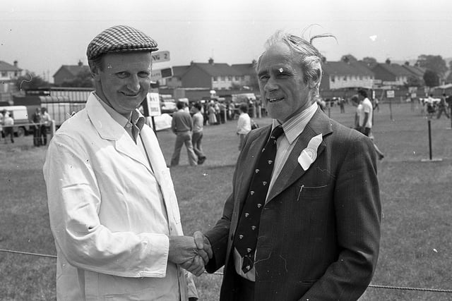 Mr David Moses, who judged the Herefords at the Ballymena Show in June 1982, congratulating Mr Eric Haire of Dundrod, who, with his brother, Ivan, won the supreme breed championship with a bull. Picture: Farming Life/News Letter archives