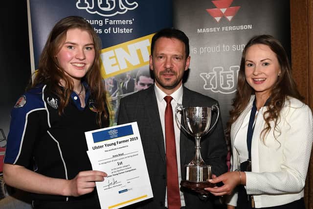 Left to right, Junior Ulster Young Farmer Anna Boyd from Straid YFC, Hugh Doherty from Danske Bank, and YFCU president Zita McNaugher