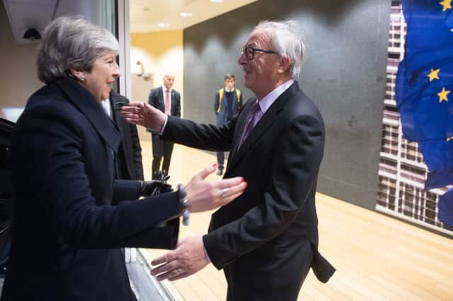 EU Commission handout picture showing EU President Jean-Claude Juncker greeting British Prime Minister Theresa May at the EU Commission in Brussels. PRESS ASSOCIATION Photo. Picture date: Friday December 8, 2017. See PA story POLITICS Brexit. Photo credit should read: Etienne Ansotte/EU/PA Wire
NOTE TO EDITORS: This handout photo may only be used in for editorial reporting purposes for the contemporaneous illustration of events, things or the people in the image or facts mentioned in the caption. Reuse of the picture may require further permission from the copyright holder.