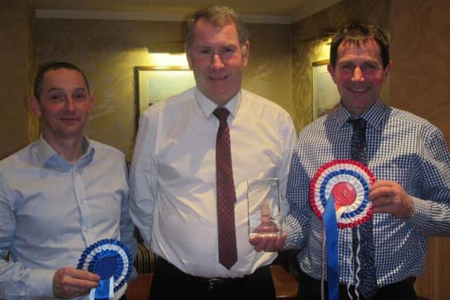 Alastair Sampson, Volac presents John Foster Springhill Texels with the Volac Show Flock Championship rosette 2017 and Alastair Gault, Forkins Texels with the Reserve Champion Volac Show Flock Championship rosette 2017.