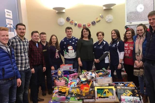 Young farmers clubs in Co.Londonderry collected toys and gifts for their chosen charity, Womens Aid