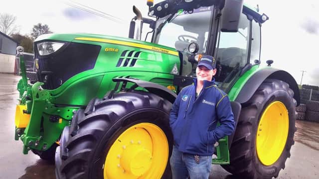 All smiles: Richard Lyons is thrilled to be the first farmer in Northern Ireland to run his tractor on Michelin AxioBib 2 tyres and says they've transformed his working day.