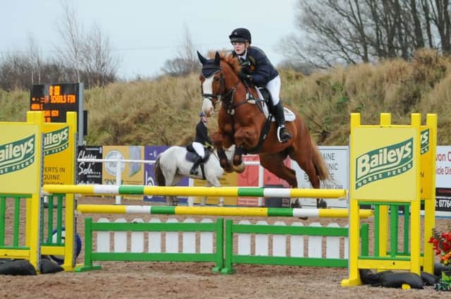 Alex Cleland riding Rafa Smash, part of the Open winning Team from Down High on the final of the league