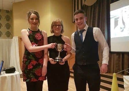 The Wilson Feed Perpetual Cup for silage assessment was presented to Kathryn McMaster and Robbie OÂ’Neill by club president Beverly Kidd