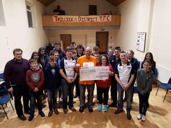 Trillick and District YFC make a cheque presentation to Ellie's Retreat