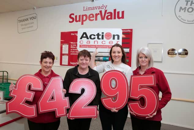 Action Cancers Amy Reynolds (second from right) is joined by SuperValu colleagues from Limavady (l to r) Roberta Mills, Ann Murray and Estelle Rose to celebrate raising Â£4295 for Action Cancer during Fundraising Week.