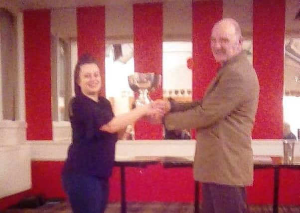 John Edgar receiving NI Show Racer Society Champion of the Year trophy from Hollie-louise Davis.