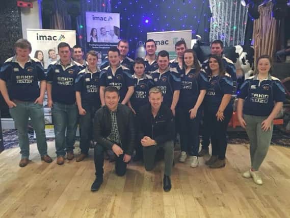 Pictured are members of City of Derry YFC with two of the headline acts Michael English and Mike Denver