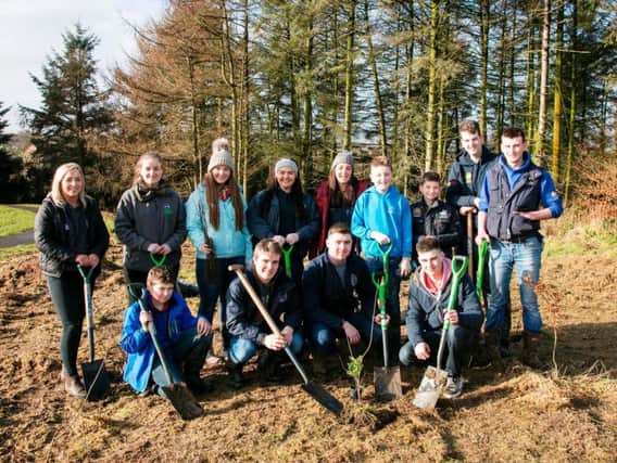 Young farmers from Crumlin and Kells and Connor YFC who got stuck in to the One Million Trees in One Day initiative at Mossley Mill, with support from Ulster Wildlifes Grassroots Challenge project. The Grassroots Challenge aims to inspire young people to take action for the environment within their local communities, thanks to National Lottery players  ulsterwildlife.org/grassroots