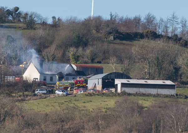Emergency services at the scene of a house fire at Molly Road, Derrylin in Co Fermanagh this morning.