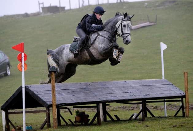 Nichola Wray on Lady Grey battle against the weather in class 3b. Picture: Sporting Images