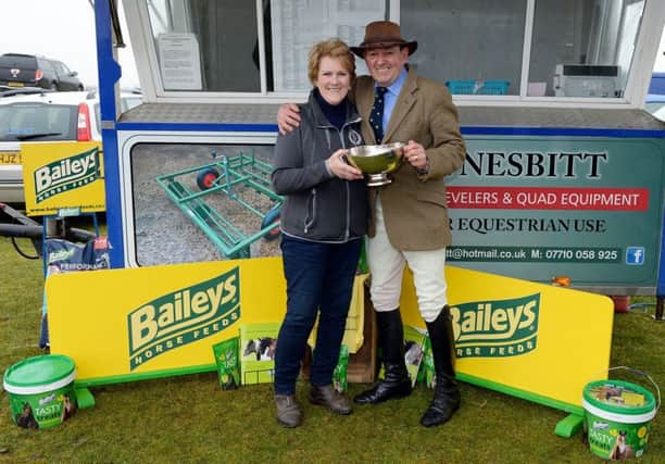 Catherine Abott presenting Denis Currie with his trophy as winner of Baileys Horse Feeds Flexi Eventing Series. Picture: Sporting Images Photography