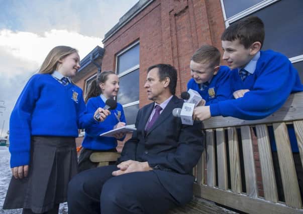 P5 pupils from St. Teresa's Primary School in Belfast, get the inside scoop from Ulster Bank's Senior Agriculture Manager, Cormac McKervey. 
Caoimhe Rice; (left), Caoimhe Conlon; Caelin Neeson and Conor Delaney (right) helped principal sponsor Ulster Bank launch this year's schools competition in the run up to the 150th Balmoral Show. The competition is searching for a budding young reporter who will become Ulster Bank's Official Balmoral Show correspondent.