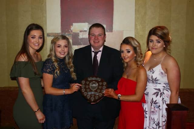 Junior quiz winners, Cappagh YFC: Bethany Swann, Rachel Jones, Natalie Burrows and Jeannie McCaffrey, pictured with county chairman, Adam Wilson, Cappagh YFC. (Missing from picture, Holly Swann)