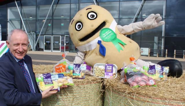 Wilson's Country managing director Lewis Cunningham got some help earlier this week in lining-up the tremendous array of potato products now available from the Co Armagh-based company
