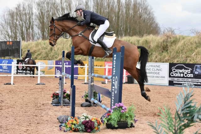 Fergus Reid riding I'm Boss W.H, winners of the five year old qualifier