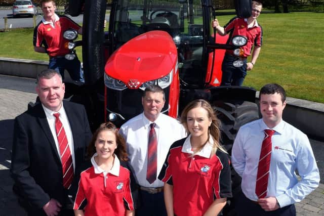 Derg Valley YFCU members pictured with AGM and conference sponsors Massey Ferguson. Representatives are, Cecil Troughton, William Bell Tractors, (left) Sean McAvoy,Â field technical manager, (centre) and Harold Goulden, sales support specialist, (right)