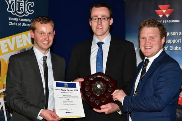 Winner of the Ulster Young Farmer 25-30 age group, sponsored by Danske Bank, is William Beattie, Finvoy YFC. William is pictured receiving the Roberta Simmons shield from Ian Dunlop, Danske Bank, and YFCU president James Speers