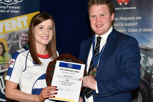 Teresa Connon from Lisnamurrican YFC who was awarded top club treasurer is pictured with James Speers, YFCU president