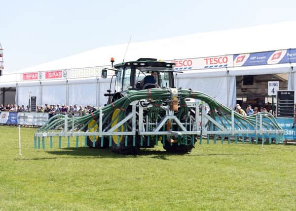 Pictured are YFCU members taking part in the 2017 final of the machinery handling competition held at Balmoral Show