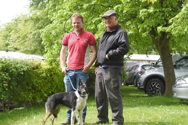 Dewi Jenkins with his 5,100gns dog, Nel, joined by buyer John Atkinson