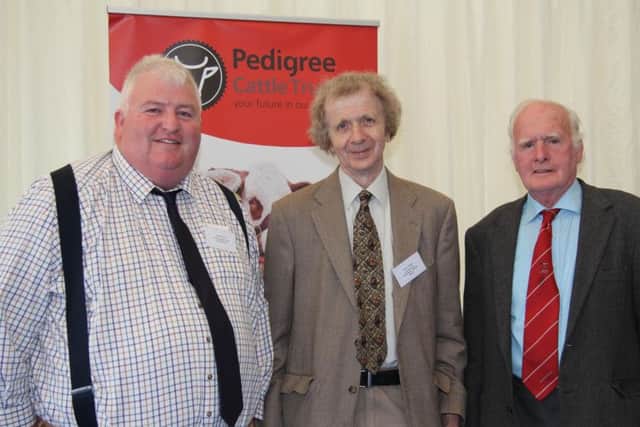 Brian Walker, centre, chairman Pedigree Cattle Trust, is pictured at Balmoral Show with Charlie Weir, vice chairman, Holstein NI; and Tom McGuigan, NI Shorthorn Club.